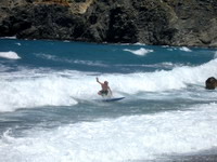 Surfing in Tinos, Greece