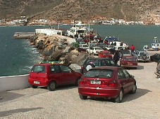Cars line up for ferry in Kamares, Sifnos